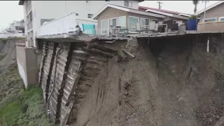 Saturated ground from rain creates sinkholes, potholes and mudslides across the county