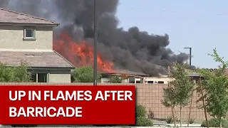 Fire burns Surprise home following standoff