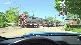 Metra commuter train with (F40PH) #113 as the power JB Tower  West Chicago IL