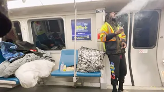 Man Smoking Marijuana Taking up four seats aboard BART Train🚅 in Oakland