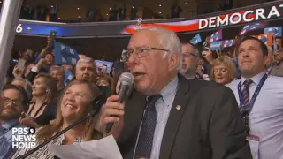 Bernie Sanders surprises crowd, moves to nominate Clinton by voice vote at the 2016 DNC