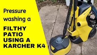 Pressure washing a filthy patio using a Karcher K4 pressure washer