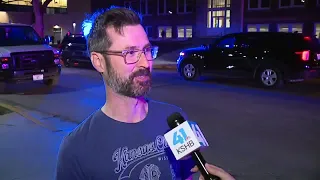 Witness describes seeing people outside NKC High School