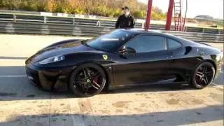 F430 leaving pit and lining up