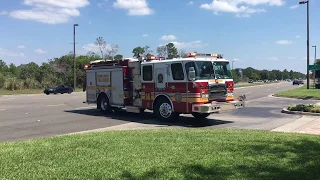 Orange County Engine 56, Rescue 56 responding code 3 to apartment fire + units staging