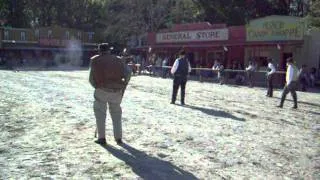 Cowboy's Firing There Guns At Another Cowboy-Scene At Wild West City,