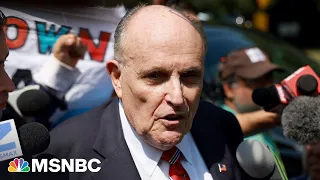 Rudy Giuliani speaks after surrendering at Fulton County jail