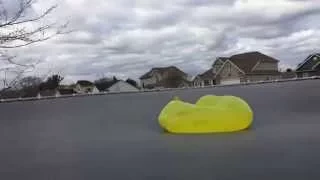 Water Balloon On Trampoline In Slow Motion