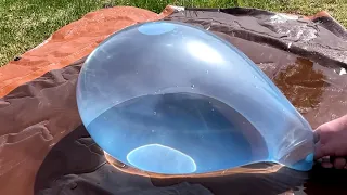 Water Balloons Popping in Slow Motion