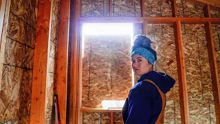 Spring is near? Installing our first window on our tiny home in the forest | DIY off grid cabin