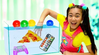 Ellie's Sink or Float Experiment in the Swimming Pool | Ellie Sparkles | WildBrain Live Action