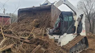 Clearing a Jungle of Cinder Blocks: Bobcat T320 Land Cleanup