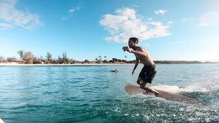 SURFING AT WHITE PLAINS BEACH - EWA BEACH, HAWAII