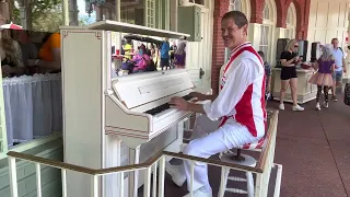 Walt Disney Worlds Pianist Neal at Casey’s Corner playing Happily Ever After and many more songs