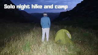 Hiking in the dark The Rhinogydd range. Jack Wolfskin Gossamer tent in strong wind. Wild camping UK.