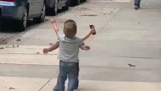 Toddlers Adorably Run Towards Each Other On Street