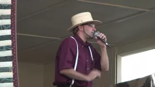 Amish Auctioneer Sells Colorful Quilt