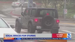 Southern California residents prep for another round of rains, winds and high surf