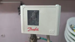 Pressure switch adjustment and electrical connection / Danfoss