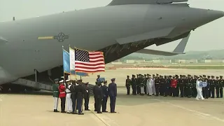 Raw: NKorea Returns US War Dead Remains