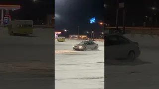 Awd Honda civic drifting in the snow.