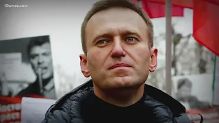 Putin foe Alexei Navalny is buried in Moscow as thousands attend under a heavy police presence