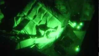 Chinooks Sling Load Supplies At Night In Afghanistan