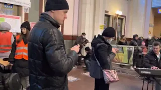 National Anthem of Ukraine at the train station. Refugees in Lviv. War russia against Ukraine 🇺🇦