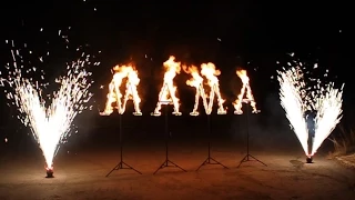 огненные буквы, МАМА, крутящиеся фонтаны, праздничный салют