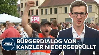 ORGANISIERTE WUTBÜRGER: Kanzler Scholz verteidigt seine Politik gegen heftige Kritik