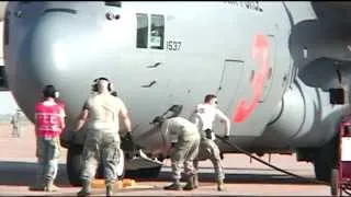 Maintenance Crews Fill C-130 Hercules MAFF with Fire Retardant Foam
