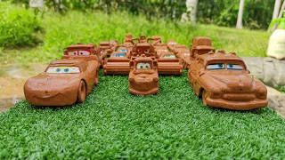 Disney Pixar Cars in the garden: Lightning McQueen, Sally Carrera, Chick Hicks, The King Dinoco