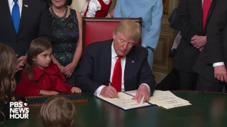 Trump signs first official documents as U.S. president