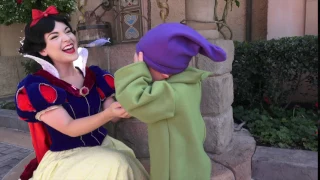 When Dopey gets a kiss from Snow White and is so overwhelmed that he has to sit down.