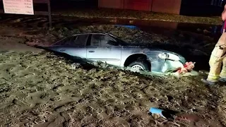Sinking car leads to water rescue