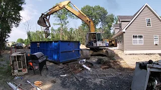 Excavator loading scrap metal