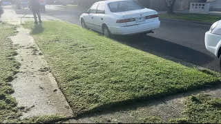 Lawn mower in a freezing morning