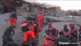 Turkey earthquake: rescuers pluck survivors from rubble