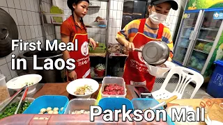 Eating the first meal in Laos at Parkson mall