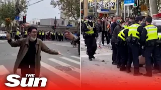 Man dragged away by Shanghai police amid COVID protests in China