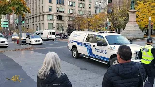 Montréal: Police motorcade escorting US dignitary passing downtown 10-28-2022