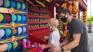 Winning Big at Universal Studios Orlando Simpsons World Carnival Games with Molly and Will