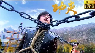 Kung Fu Movie: The lad ignites his formidable inner power, shattering the iron chain to kill all.