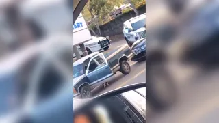 Toddler puts hands up during arrest