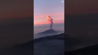 Volcano sunrise captured by airline passengers