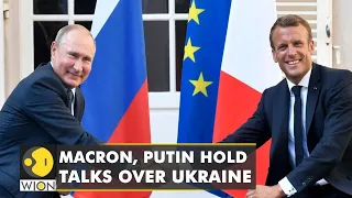 Vladimir Putin holds talks with Emmanuel Macron for 5 hours in a bid to calm tensions over Ukraine