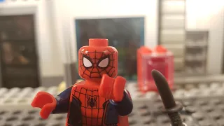 the amazing spiderman: OH MY WEAKNESS!! ITS SMALL KNIVES! but in lego