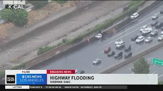 Flooded lanes on 101 Freeway in Sherman Oaks slows down traffic