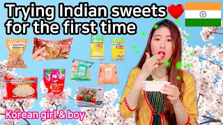Korean girl wearing Kurti trying Indian sweets for the first time