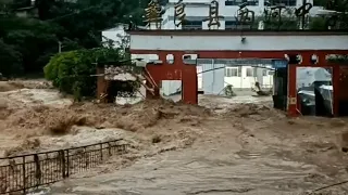 China river burst and flooding! Street and car flooded in Yunnan province